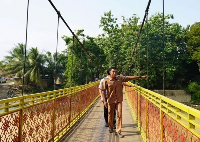 Menjaga dari Ujung Dusun IV Muara Tiku: Perjalanan Feri Memastikan JKN Menjangkau Suku Anak Dalam