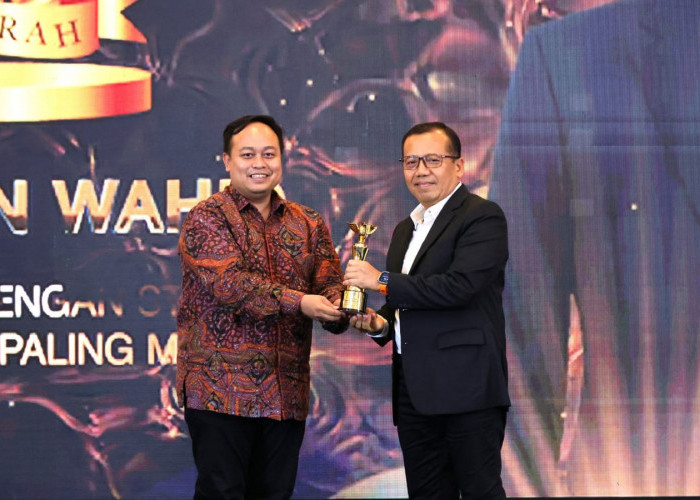 Kementerian ATR/BPN Terima Penghargaan dari INDOPOSCO atas Diseminasi Strategi Komunikasi yang Paling Masif