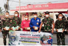 SKK Migas–KKKS SRMD Bersama Yonif TP 846/KS Bagikan Masker, Cegah ISPA di Tengah Kabut Asap Muratara